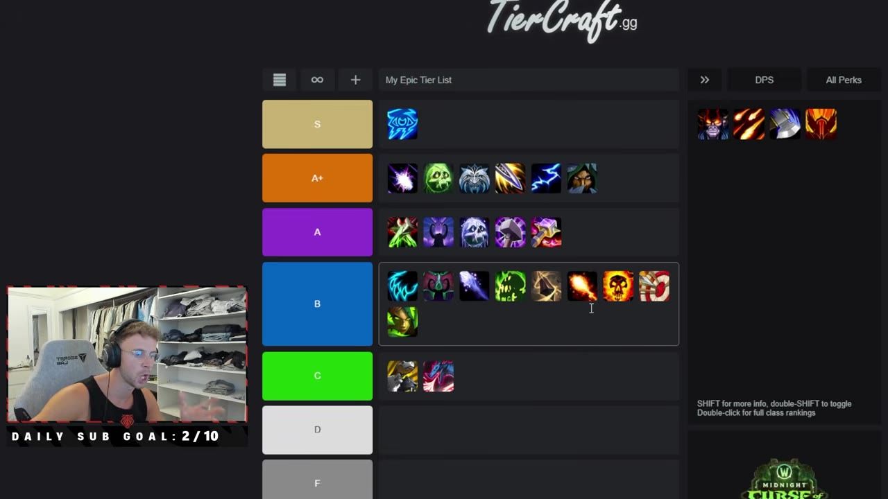 A tier list website is open with several class icons arranged in ranked rows from S to F, while a webcam overlay shows a person speaking in the lower left corner.