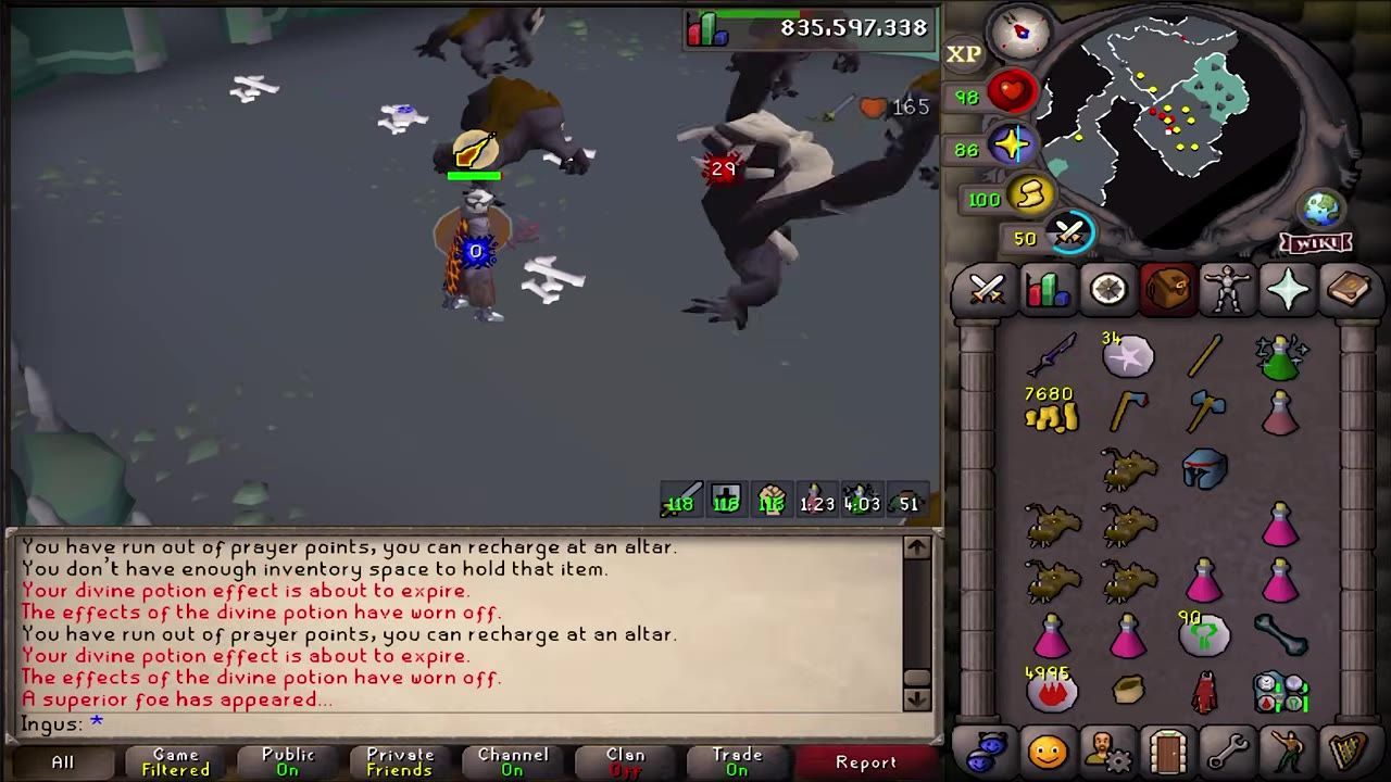 A notification in the chat interface indicates the appearance of a superior slayer foe, with an ongoing combat scene.