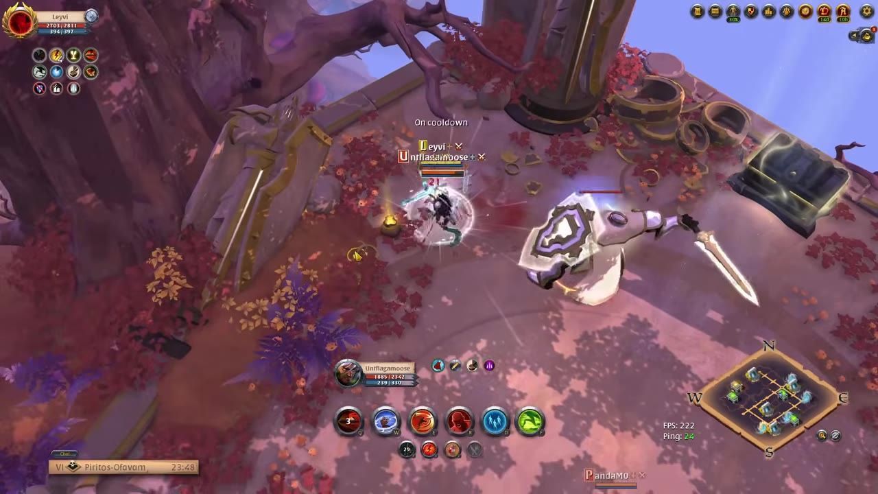 Gameplay image showing a player in Albion Online engaged in combat near a treasure chest.