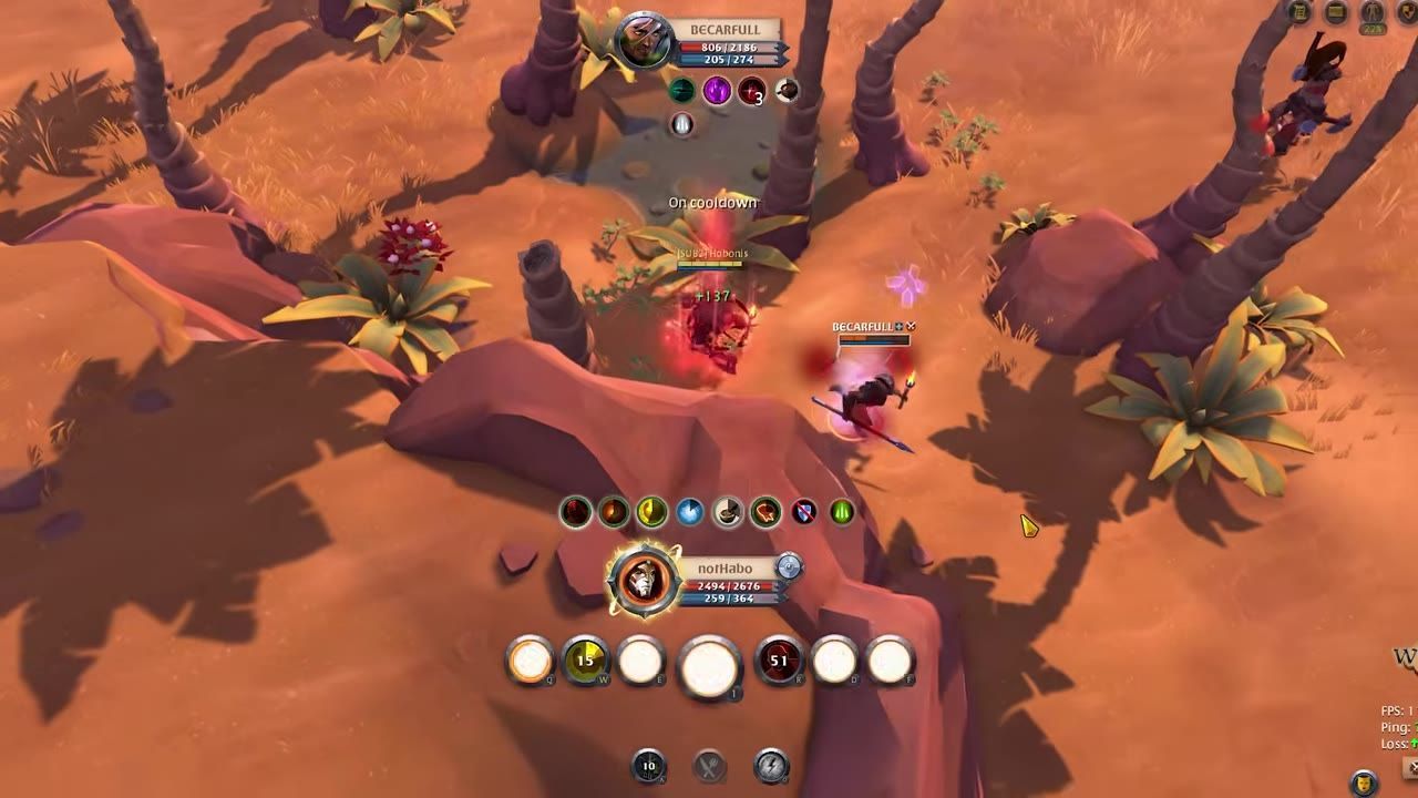 Two characters engaging in combat in a desert terrain with their abilities visible.